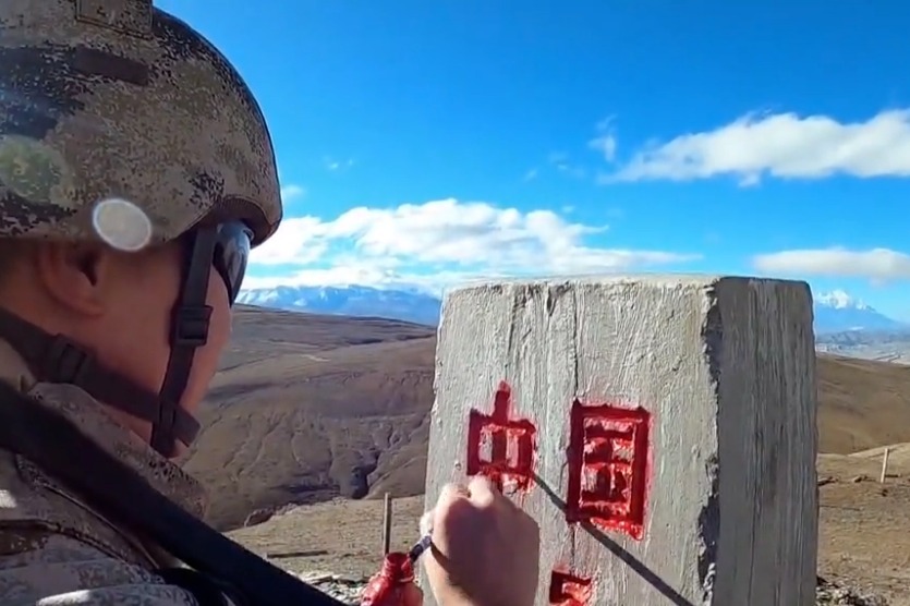 新闻特写一天走四季巡逻在鲜花盛开的地方