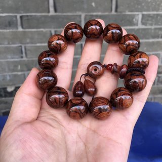 黄花梨对眼和鬼脸区别在哪里？_凤凰网